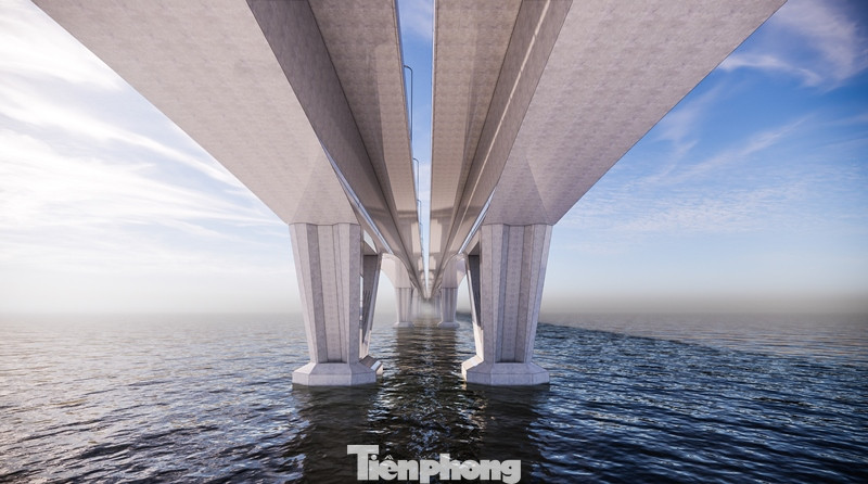 Hai đơn nguyên cầu xây sát nhau với góc nhìn từ dưới mặt nước sông Hồng lên.