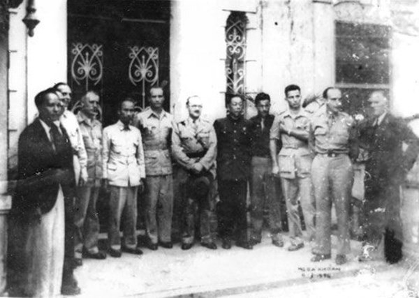 Chủ tịch Hồ Chí Minh và các đại biểu Anh, Mỹ, Trung Quốc tại Lễ ký kết Hiệp định Sơ bộ ngày 6-3-1946. Ảnh tư liệu.