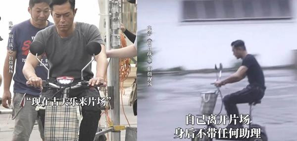 Cổ Thiên Lạc đến phim trường trên chiếc xe đạp điện. Ảnh: PBE Media.