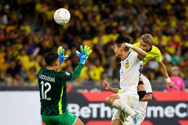 Mohamad Faisal ghi bàn trong trận gặp Lào. Ảnh: Bernama. Mohamad Faisal ghi bàn trong trận gặp Lào. Ảnh: Bernama.