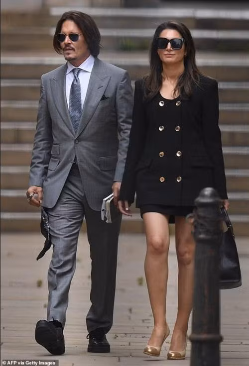 Depp và Rich hồi năm 2020, khi Depp kiện tờ The Sun. Ảnh: AFP via Getty.