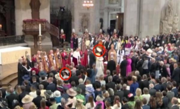 Meghan (bên trái, đội mũ trắng) quay đi hướng khác khi Công nương Kate (phải) đi ngang. Ảnh: The Sun. Meghan (bên trái, đội mũ trắng) quay đi hướng khác khi Công nương Kate (phải) đi ngang. Ảnh: The Sun.