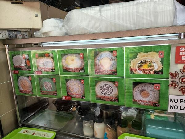 Các món ăn ở quầy hàng của cô Hạnh. Ảnh: Ong Chin Meng Zidane. Các món ăn ở quầy hàng của cô Hạnh. Ảnh: Ong Chin Meng Zidane.