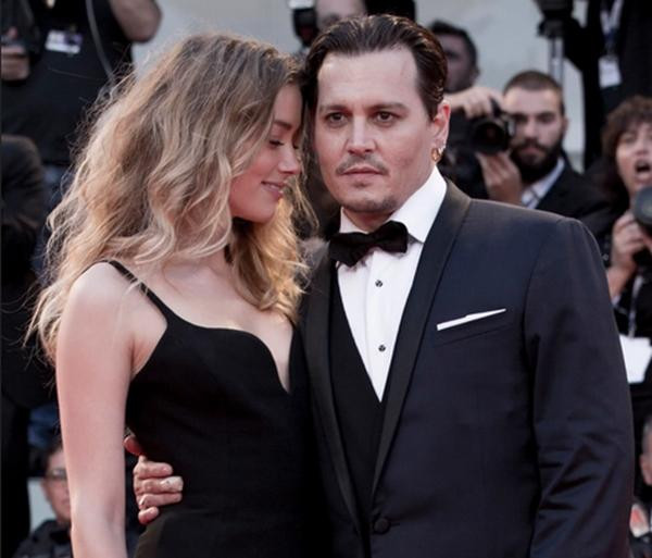 Tình yêu của đời nhau nhưng chia tay nhiều năm rồi vẫn rất ồn ào. Ảnh: Steve Helber/ Pool via REUTERS.