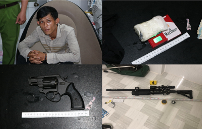 Nguyễn Quốc Huy cùng tang vật. Ảnh: Phạm Hơn Nguyễn Quốc Huy cùng tang vật. Ảnh: Phạm Hơn