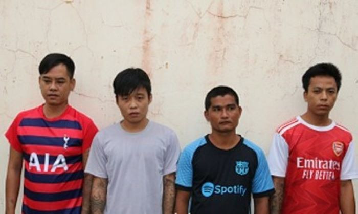 Các bị can tại cơ quan công an. Ảnh: Phạm Hơn.