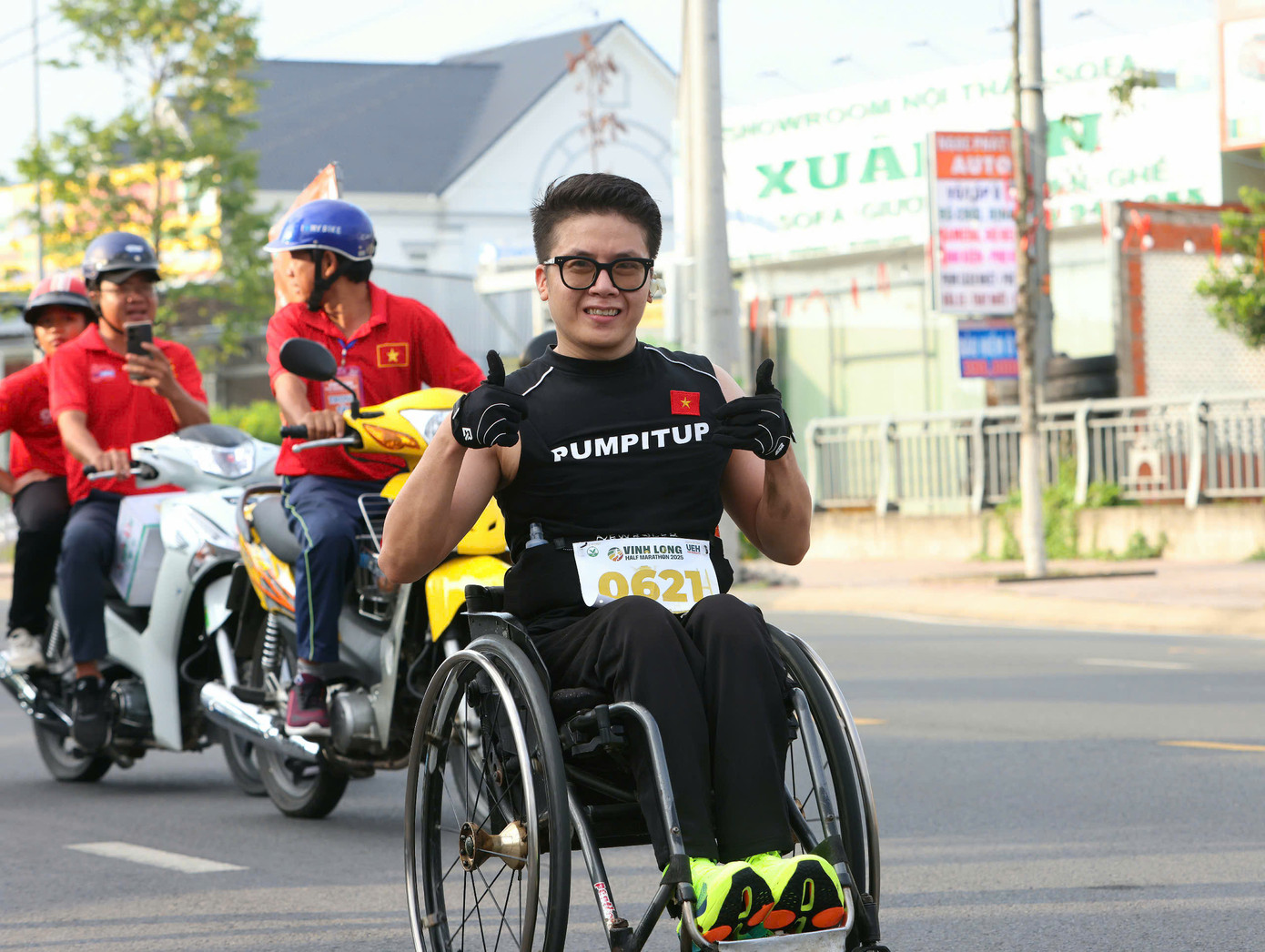 Vận động viên xe lăn tham gia cự ly 21km.