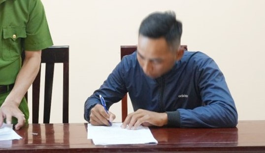 Phạm Văn Vinh tại cơ quan công an. Ảnh: T.P Phạm Văn Vinh tại cơ quan công an. Ảnh: T.P