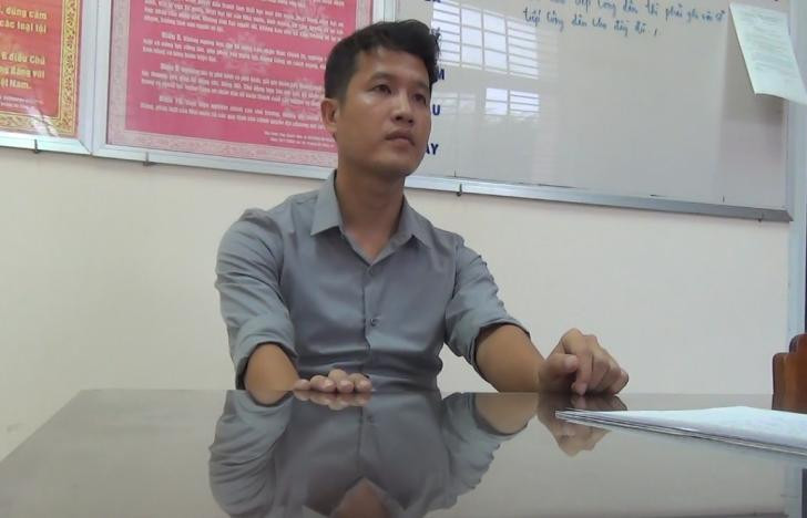 Đặng Văn Bào tại cơ quan công an. Đặng Văn Bào tại cơ quan công an.