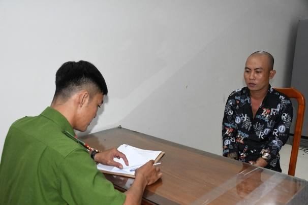 Lê Văn Tài tại cơ quan Công an.