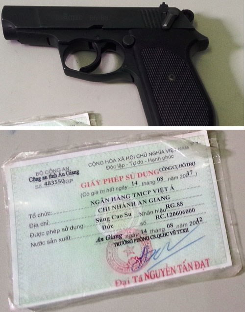 Sếp phó VietABank chĩa súng vào mặt nhân viên taxi có bị xử lý? ảnh 1