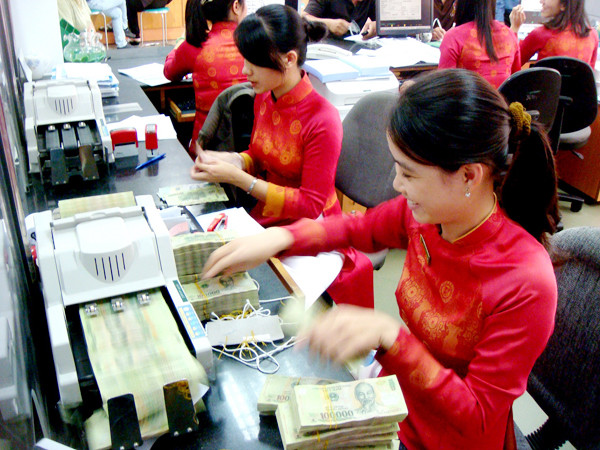 Ngân hàng ứ đọng vốn nhưng ngại cho vay, trong khi DN đang khát vốn. Ảnh: Đại Dương. Ngân hàng ứ đọng vốn nhưng ngại cho vay, trong khi DN đang khát vốn Ảnh: Đại Dương