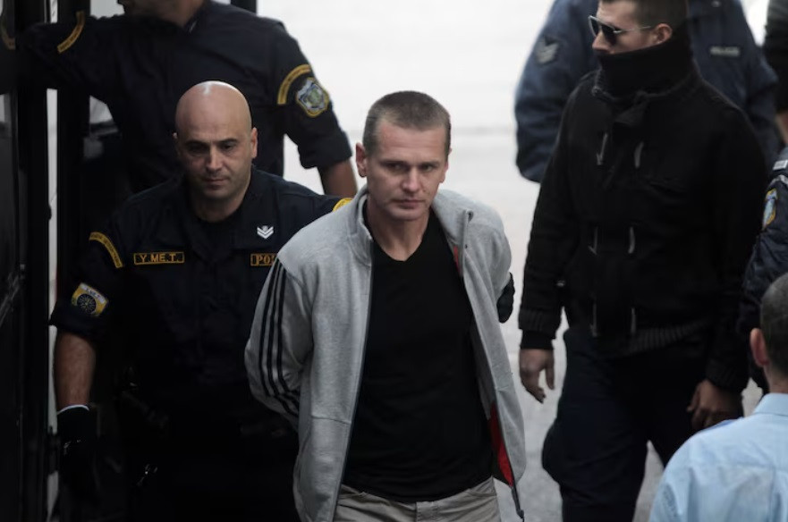 Alexander Vinnik bị cảnh sát hộ tống đến tòa án ở Hy Lạp, năm 2017. (Ảnh: Reuters) Alexander Vinnik bị cảnh sát hộ tống đến tòa án ở Hy Lạp, năm 2017. (Ảnh: Reuters)