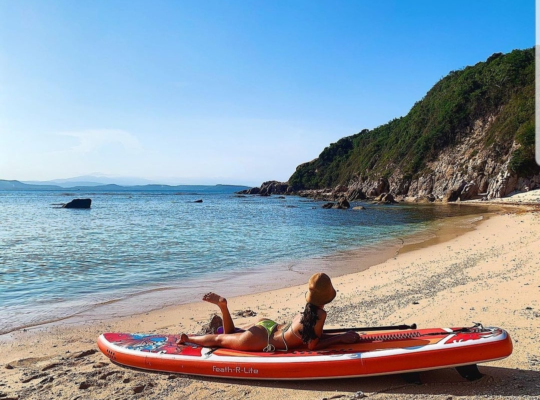 Chèo Sup là hoạt động không nên bỏ qua khi đến Cù Lao Mái Nhà. (Ảnh: herione.nguyen)