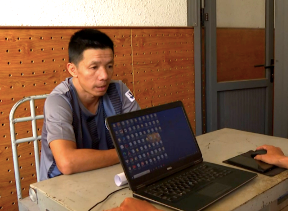 Tài xế Lê Anh Tuấn tại cơ quan công an