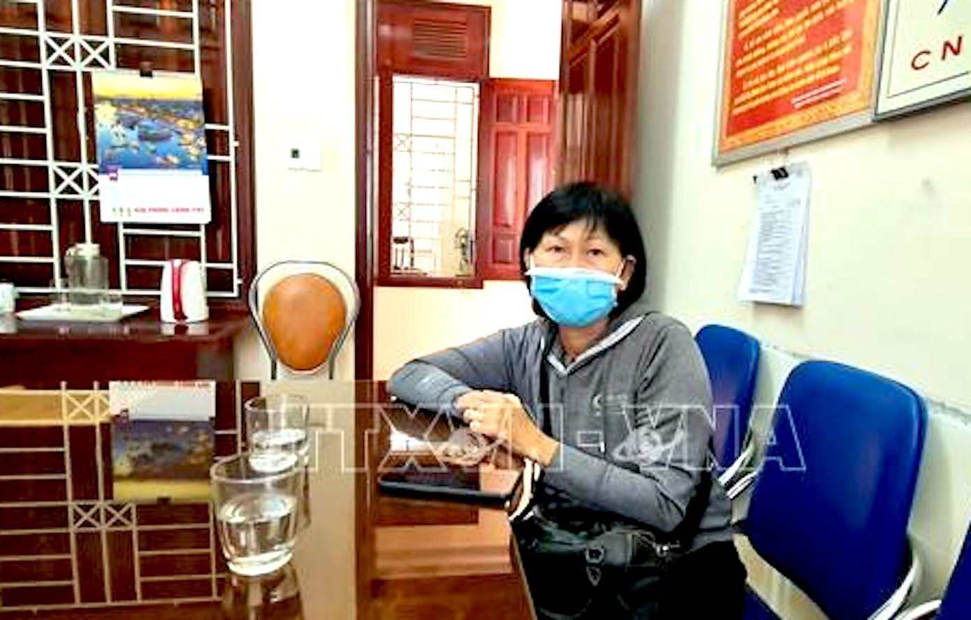 Bà N.T.T.H. tại cơ quan công an. Ảnh TTXVN
