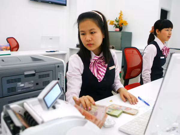Việc chi thù lao hàng triệu USD cho HĐQT và BKS các ngân hàng góp phần đẩy chi phí ngân hàng lên cao Ảnh minh họa: Hồng Vĩnh