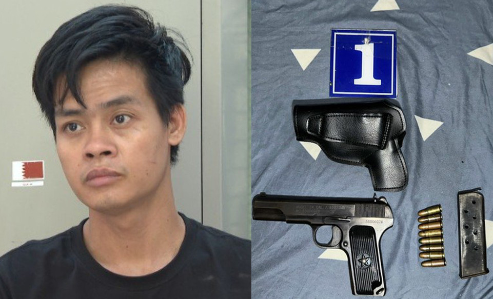 Nguyễn Quốc Việt cùng khẩu súng và 8 viên đạn. Ảnh: Công an cung cấp.