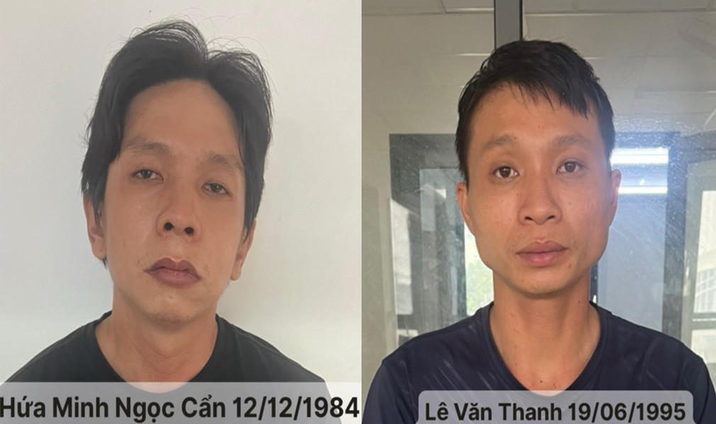 Cẩn và Thanh tại cơ quan công an. Ảnh: H.T.