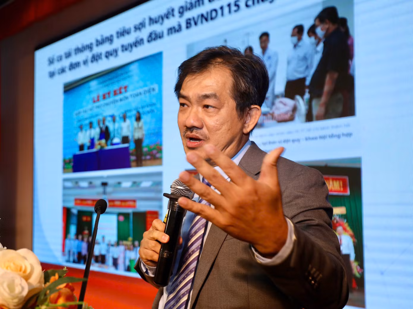 PGS.TS.BS Nguyễn Huy Thắng trình bày tham luận tại hội thảo. Ảnh: Duy Anh.