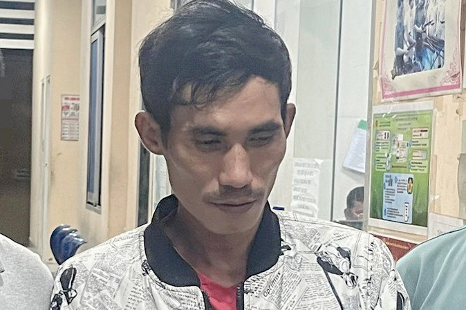 Lâm Văn Tình lúc bị bắt. Lâm Văn Tình lúc bị bắt.