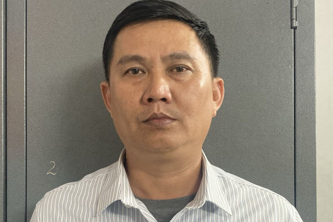 Nguyễn Thành Tân tại cơ quan công an. Ảnh: Công an cung cấp.