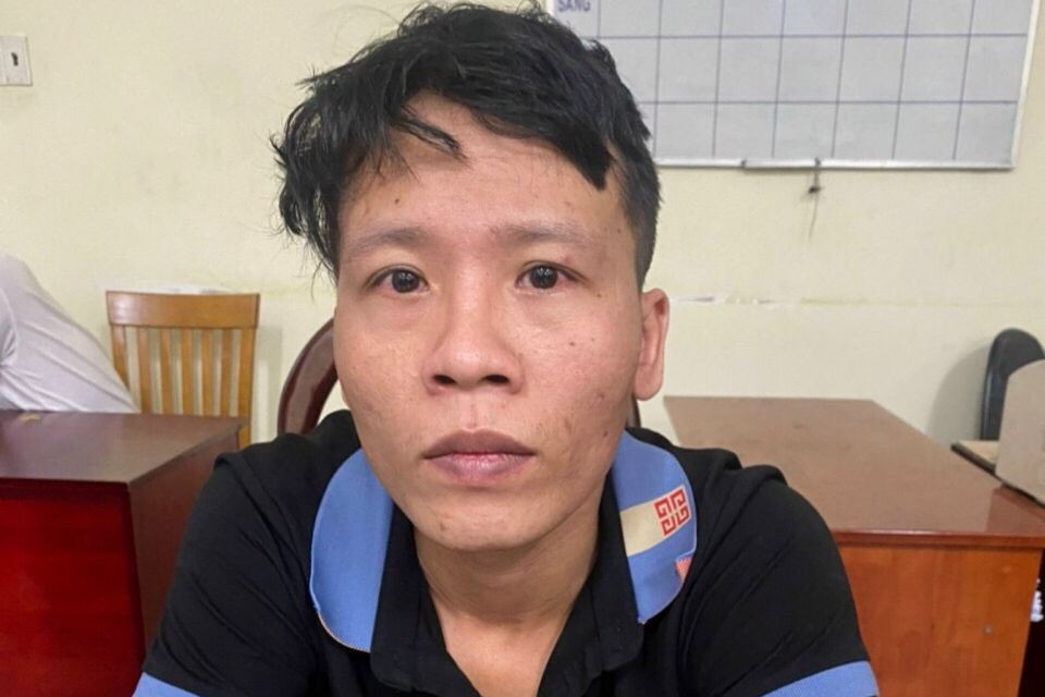 Lê Đình Tuấn lúc bị bắt giữ. Ảnh: N.T.