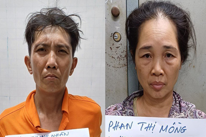 Hai nghi can tại trụ sở công an.