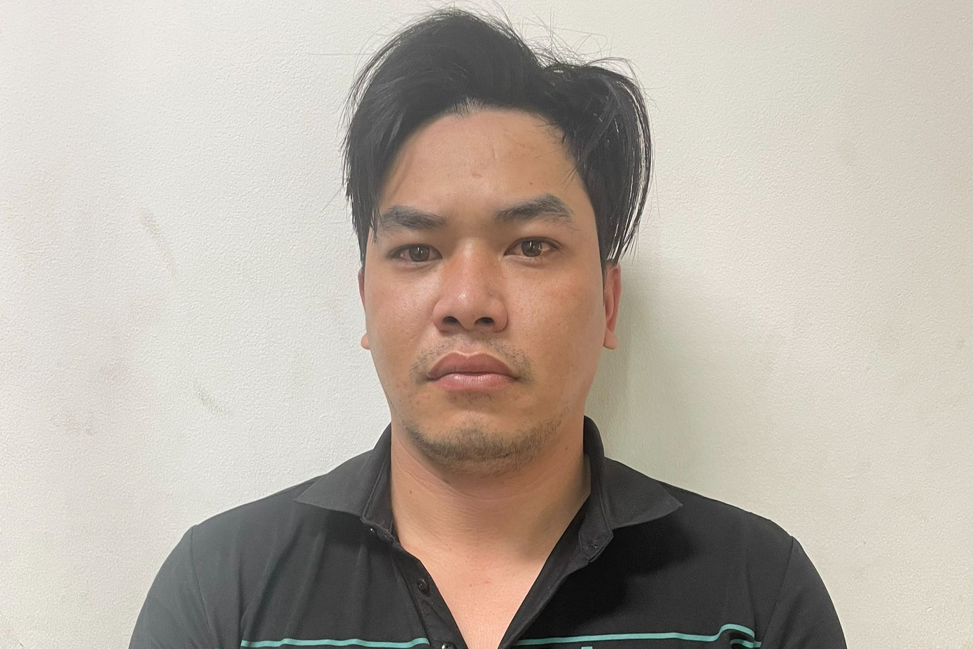 Nghi phạm Trần Văn Hưng lúc bị bắt.