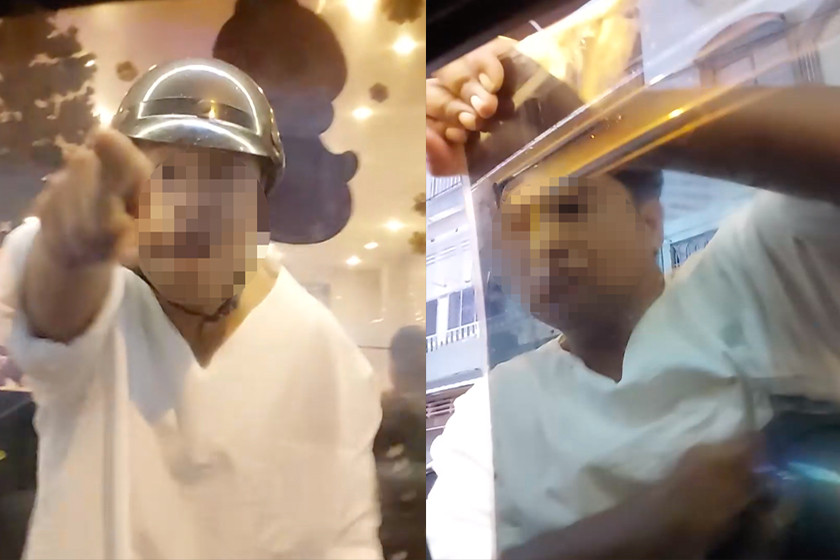 Ông B. đe dọa và dùng tay bẻ kính ô tô. Ảnh: C.A.