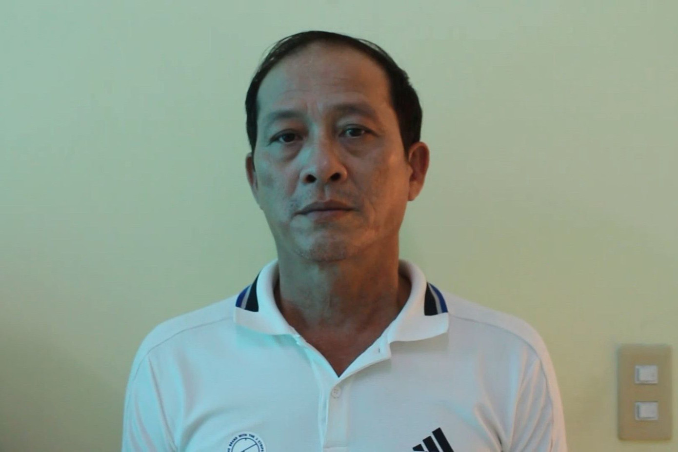 Ông Quách Ngọc Giao tại cơ quan công an.