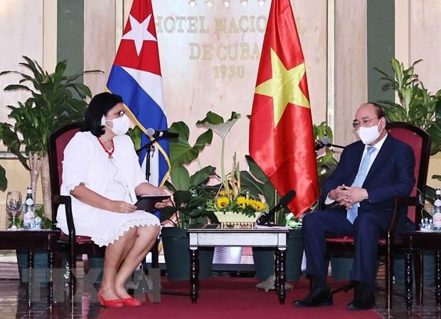 Chủ tịch nước Nguyễn Xuân Phúc tiếp Phó Chủ tịch thứ nhất Viện Cuba hữu nghị với các dân tộc (ICAP) Noemi Rabaza Fernandesz. (Ảnh: Thống Nhất/TTXVN) Chủ tịch nước Nguyễn Xuân Phúc tiếp Phó Chủ tịch thứ nhất Viện Cuba hữu nghị với các dân tộc (ICAP) Noemi Rabaza Fernandesz. (Ảnh: Thống Nhất/TTXVN)