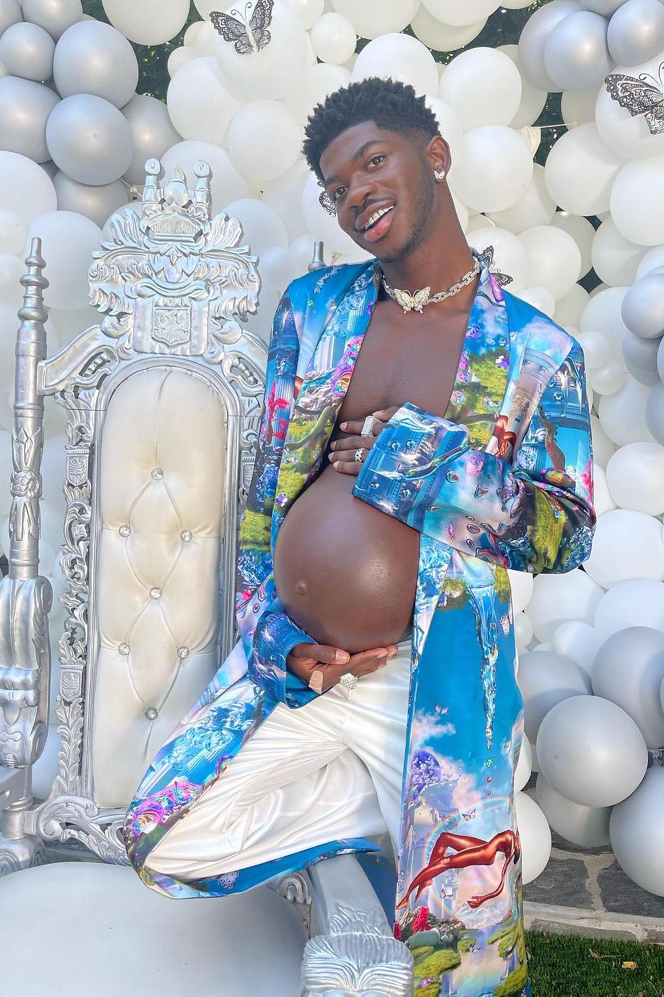 Lil Nas X khoe "bụng chửa vượt mặt" trong tiệc mừng ra mắt album "Montero". Ảnh: Instagram