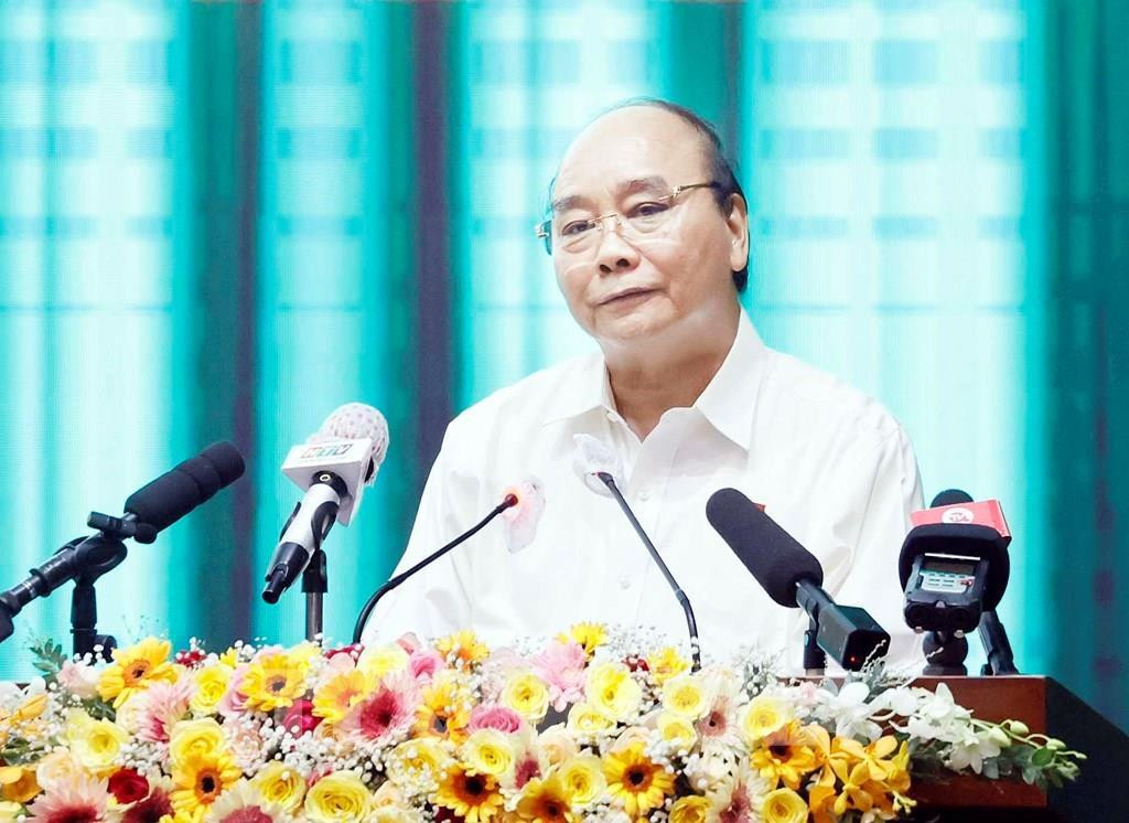 Chủ tịch nước Nguyễn Xuân Phúc phát biểu tại buổi tiếp xúc cử tri TPHCM. Ảnh: TTXVN