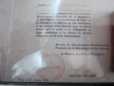Bản xác nhận Michel có công lái xe suốt bốn năm trời của Bộ trưởng Nguyễn Thị Bình đúng ngày 27-1-1973