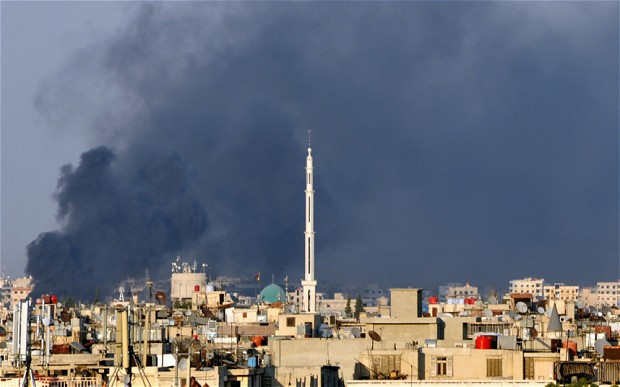 Những đám khói từ những tòa nhà ở Thủ đô Damascus của Syria