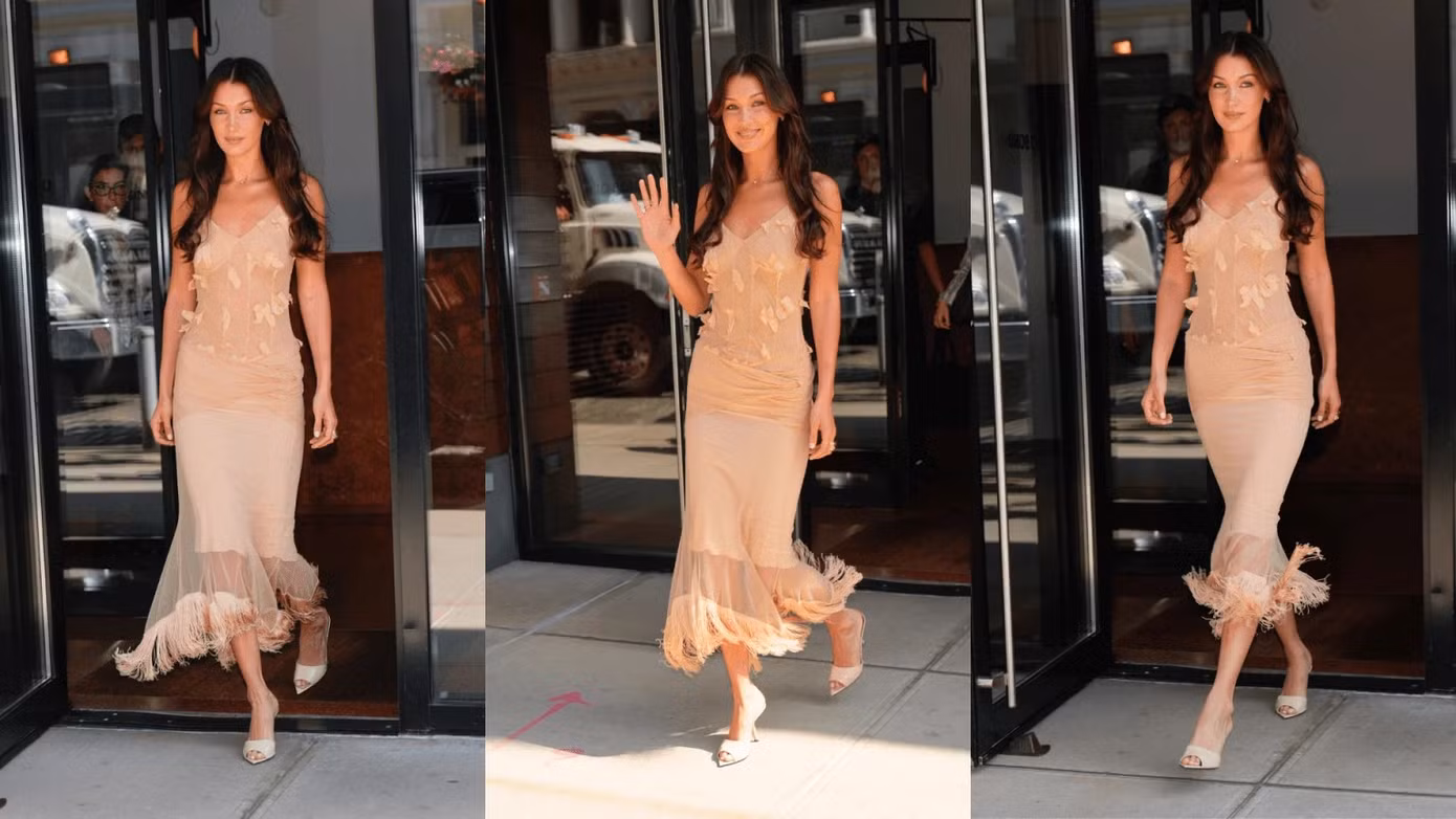 Bella Hadid xuất hiện quyến rũ trong một chiếc váy lưới vintage màu nude cổ chữ V thanh tao.