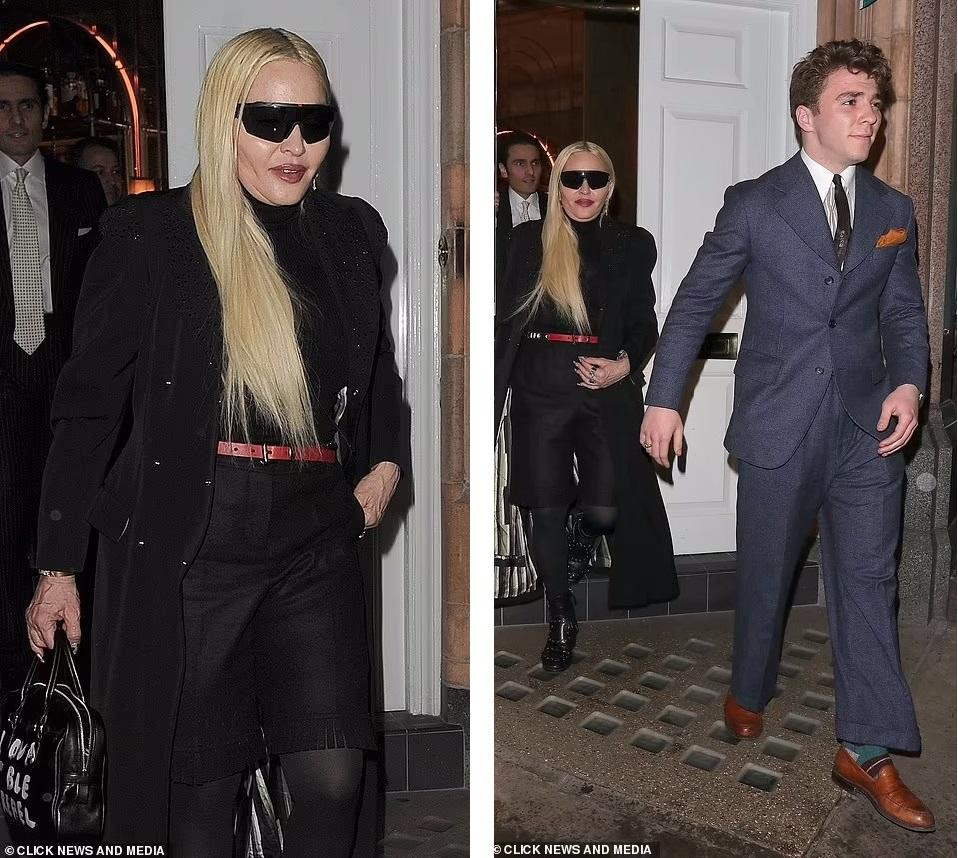 "Nữ hoàng nhạc pop" xuất hiện với "cây đen", điểm nhấn là mái tóc vàng và thắt lưng da màu đỏ. Trong khi đó, Rocco bảnh bao trong bộ vest xanh và giày da vàng bò bóng lộn.