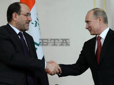 Thủ tướng Iraq Nuri al Maliki (trái) và Tổng thống Nga Vladimir Putin. Ảnh: TTXVN