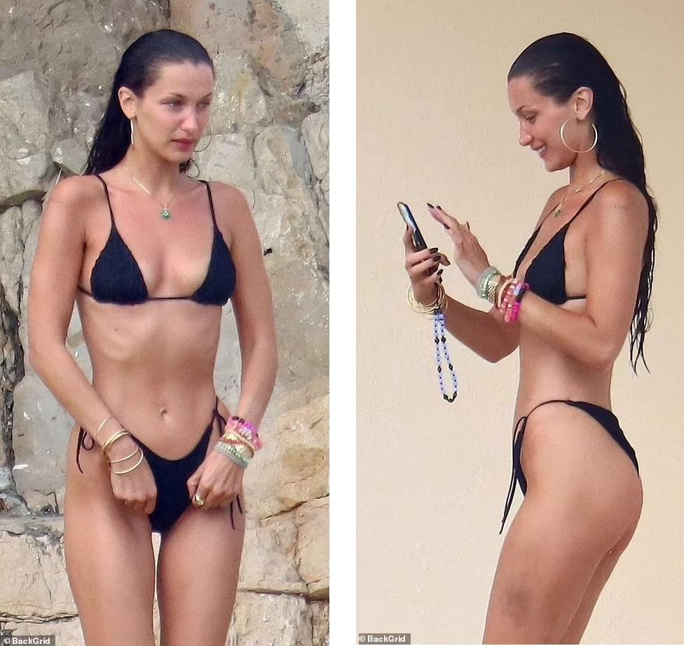 Đi tắm biển nhưng Bella đeo rất nhiều phụ kiện trên người từ khuyên tai, dây chuyền, nhẫn và vô số vòng tay các loại.