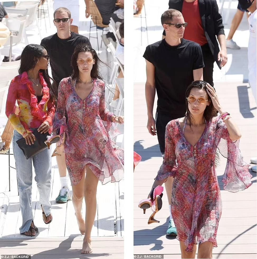 Được mời tới Pháp dự Liên hoan phim Cannes 2021, Bella Hadid mới chỉ xuất hiện trên thảm đỏ sự kiện hai lần. Thay vào đó, cô dành nhiều thời gian hơn để tận hưởng kỳ nghỉ lãng mạn bên tình mới Marc Kalman. Mới đây, cô tiếp tục bị bắt gặp đi ăn trưa và tắm nắng trên biển cùng bạn trai và những người bạn.
