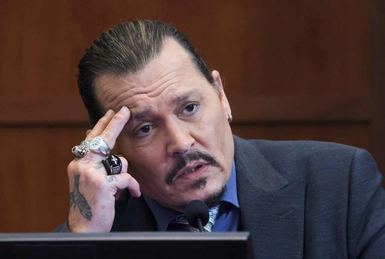 Johnny Depp khẳng định, điều anh tìm kiếm tại phiên tòa này không phải là tiền bạc mà là thanh danh (Ảnh: Reuters).
