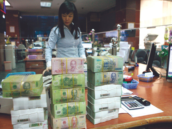 Ngân hàng sẽ tiếp tục giảm lãi suất. Ảnh: Hồng Vĩnh