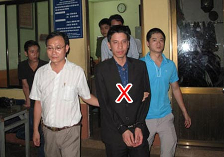 Dẫn giải Nguyễn Mạnh Hà (X). Ảnh: CAND