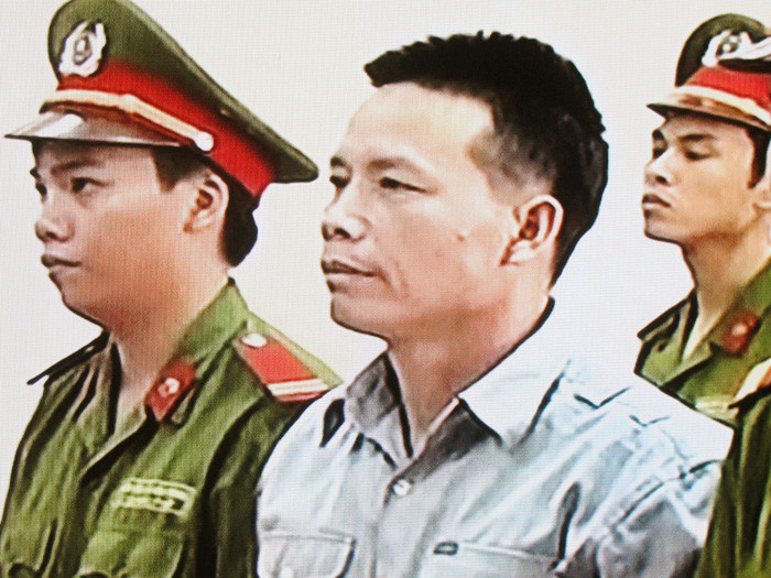 Bị cáo Đoàn Văn Vươn trong phiên tòa sáng nay (30/7)