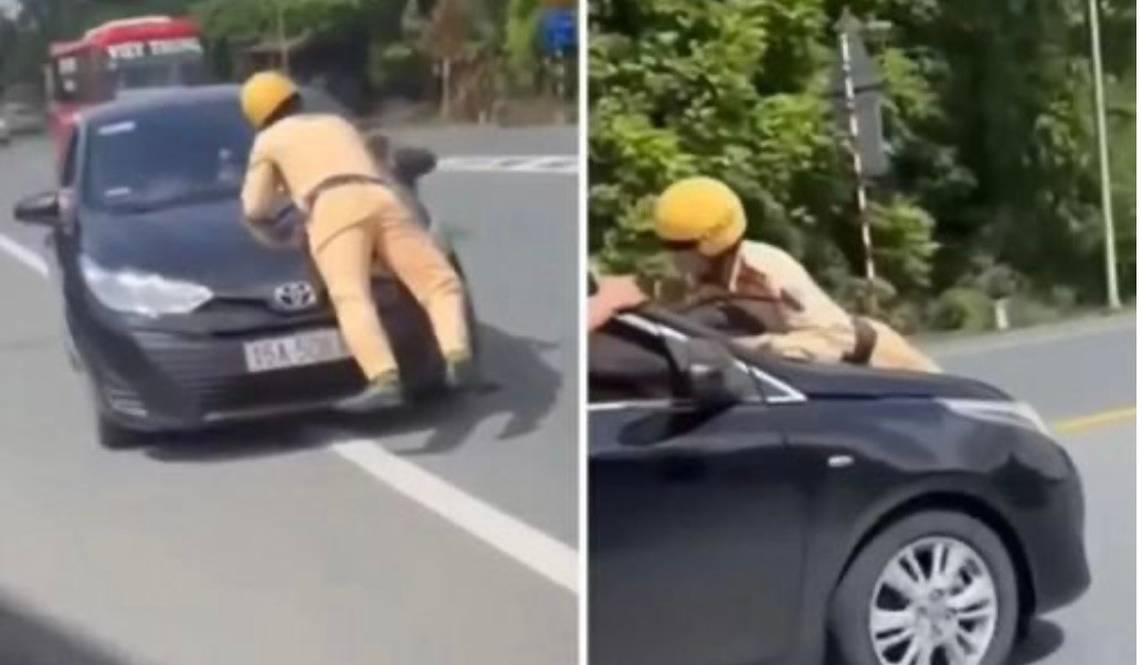 Hình ảnh cán bộ CSGT bị nam tài xế hất lên nắp capo, di chuyển trên quốc lộ 10.