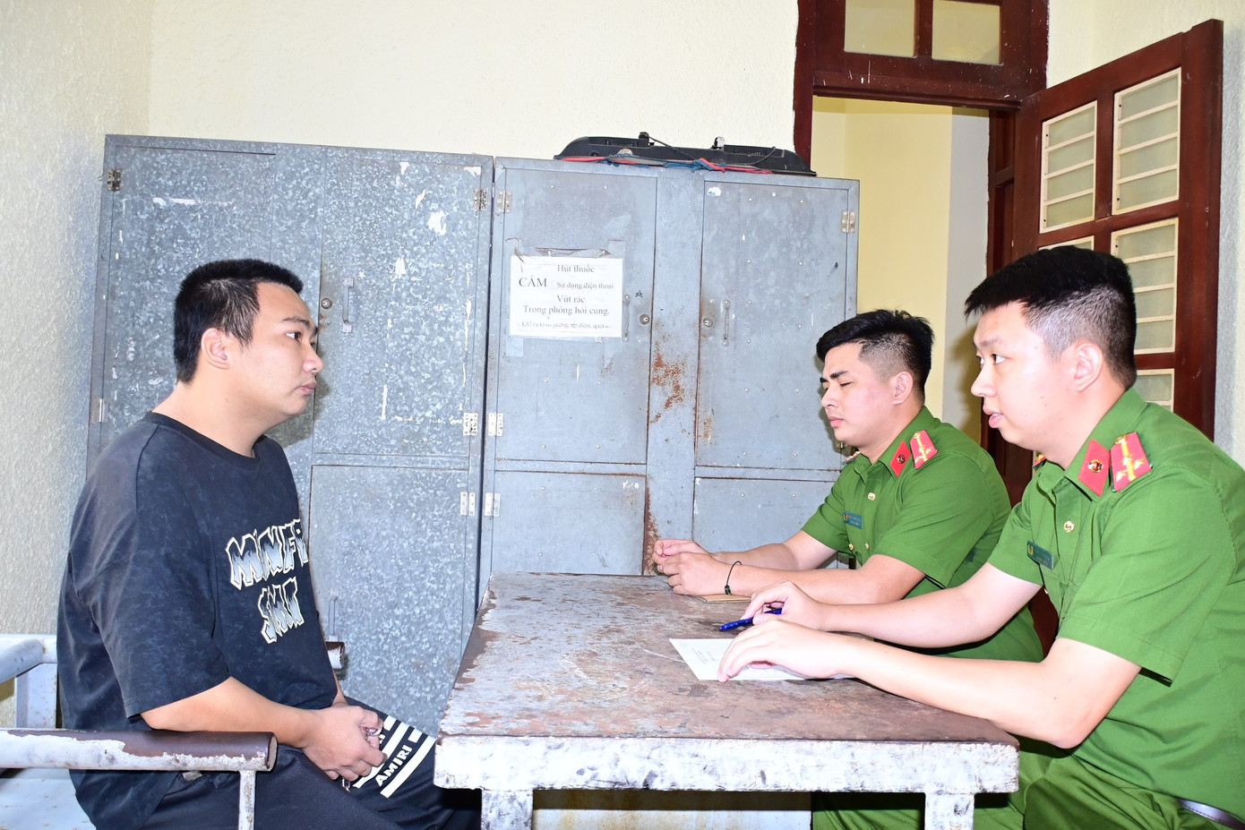 Bị can Bùi Thế Quyền tại cơ quan công an.