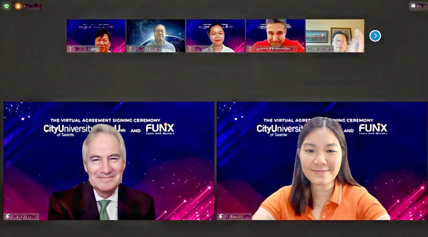 Ông Randy C. Frisch - Hiệu trưởng ĐH CityU và bà Lê Minh Đức - Giám đốc Điều hành FUNiX tại Lễ Ký kết diễn ra sáng 17/8.