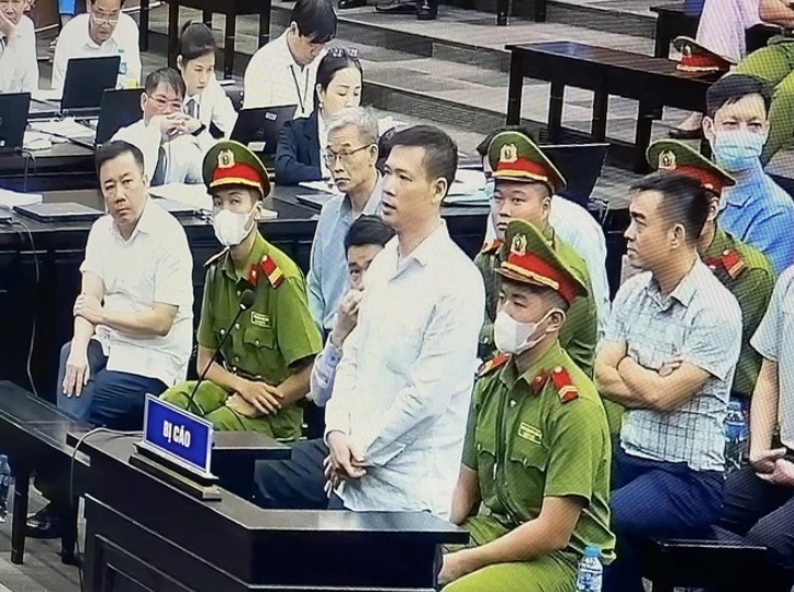 Bị can Trần Minh Tuấn (trong phiên tòa giai đoạn 1 vụ án). Bị can Trần Minh Tuấn (trong phiên tòa giai đoạn 1 vụ án).