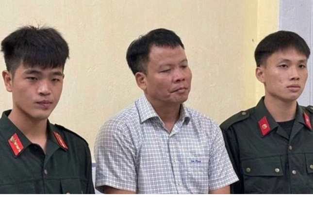 Ông Đồng Xuân Thụ tại cơ quan công an.